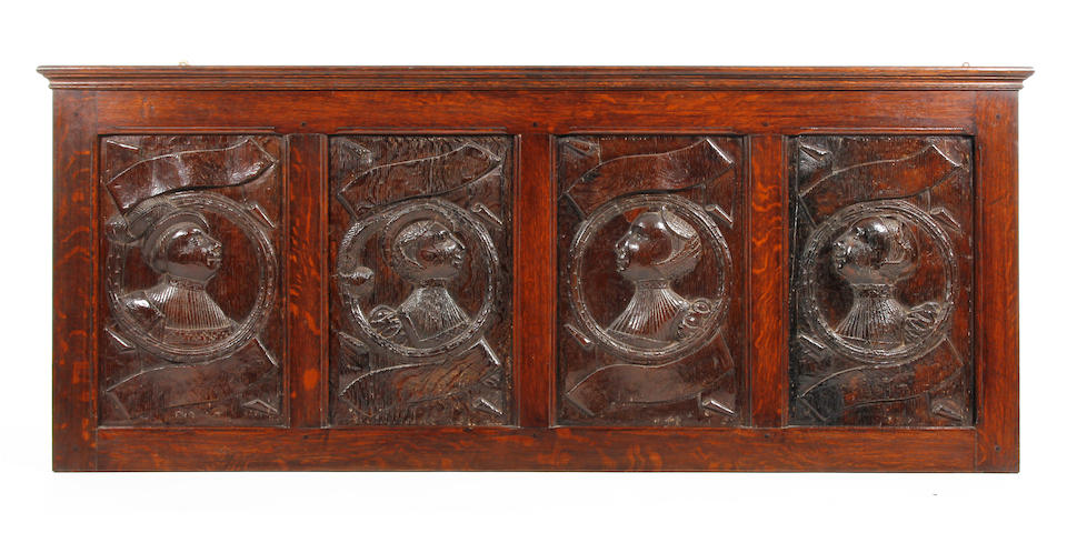 A superb set of four early Elizabethan carved oak 'Romayne' bust portrait panels Circa 1560, probably depicting members of the Stanley Family of Hooton Hall, Wirral