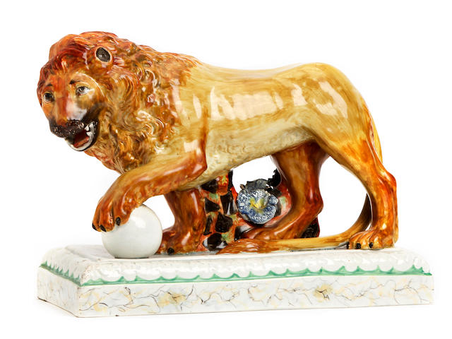 A pearlware figure of a lion