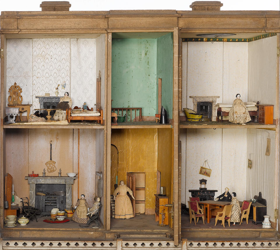 A fine and important English Dolls House on three drawer stand, early 19th century