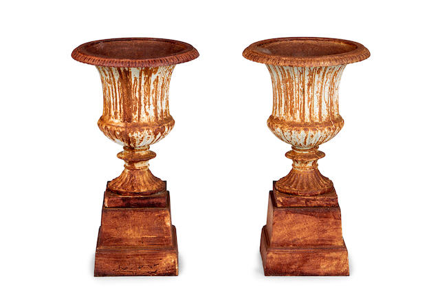 A pair of cast iron urns French, late 19th century