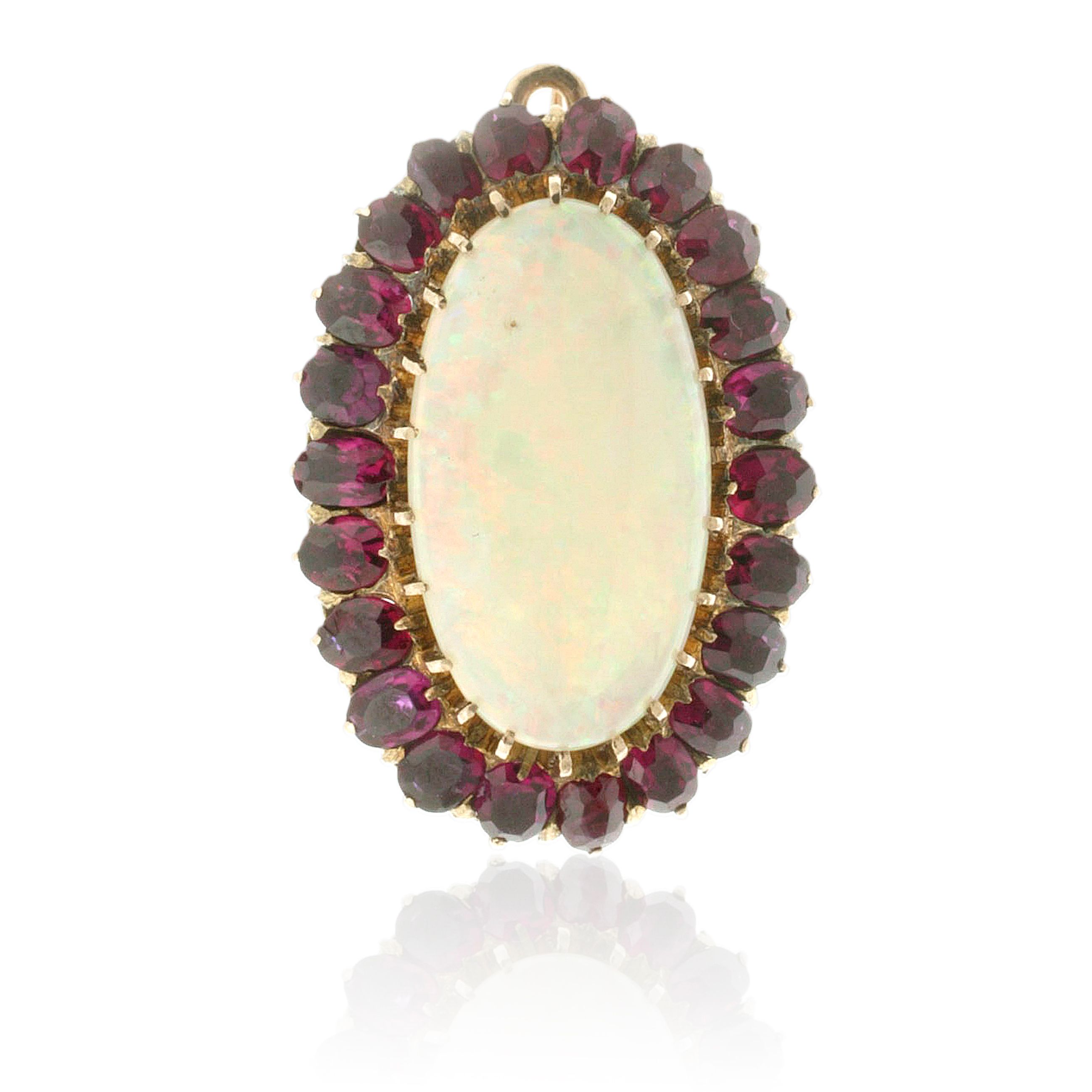 A white opal and ruby brooch