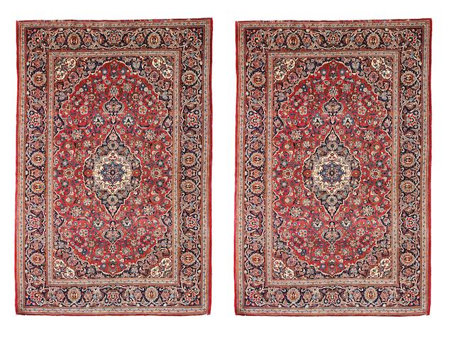 A matched pair of Kashan rugs Iran, circa 1950 210cm x 140cm