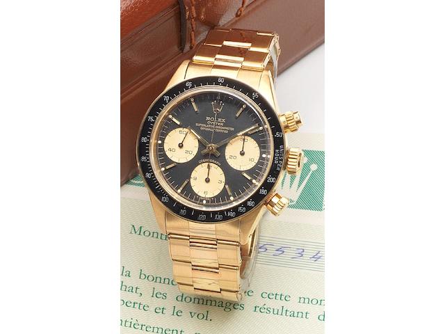 Rolex. A very fine and rare 18ct gold chronograph bracelet watch together with fitted presentation box, instructions and guaranteeRef:6263, Case No.5534497, Cosmograph, Sold December 1979