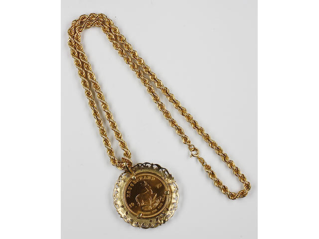 South Africa: A krugerrand, 1975, in scolled 9ct gold pendant mount, suspended on a 9ct gold uniform ropetwist chain necklace,