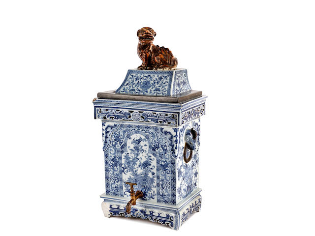 An 18th Century Chinese blue and white water cistern and cover
