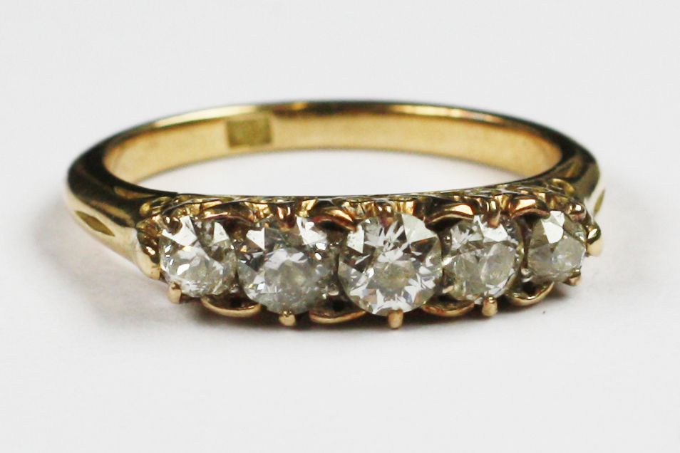 A diamond five stone ring