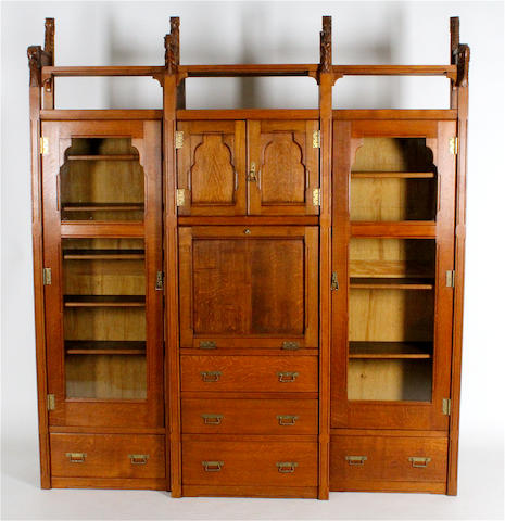 A Gothic revival oak breakfront secretaire type bookcase