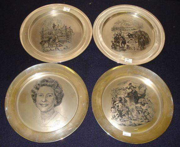 An Elizabeth II 1977 silver Commemorative plate, by Toye Kenning & Spencer Ltd, boxed, together with three others Dickens scenes with certificates, 55ozs approximately total.