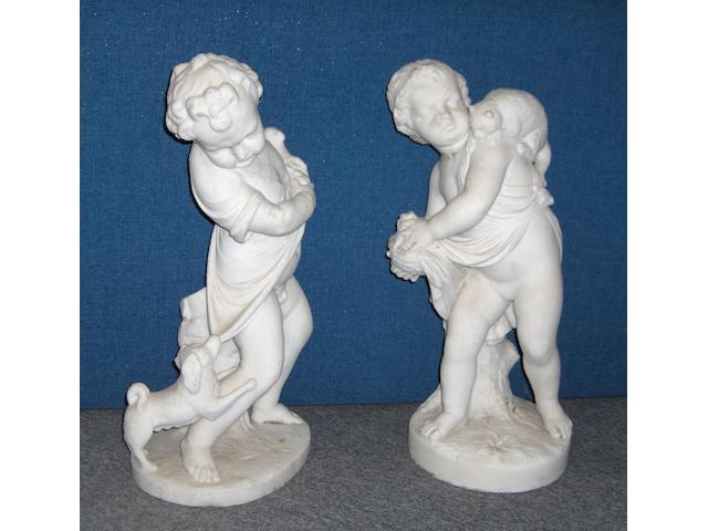 Two 19th century carved marble figures of children,