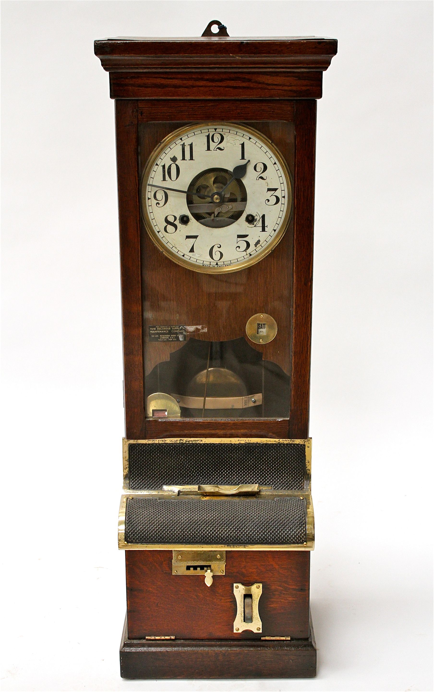 An oak clocking-in machine