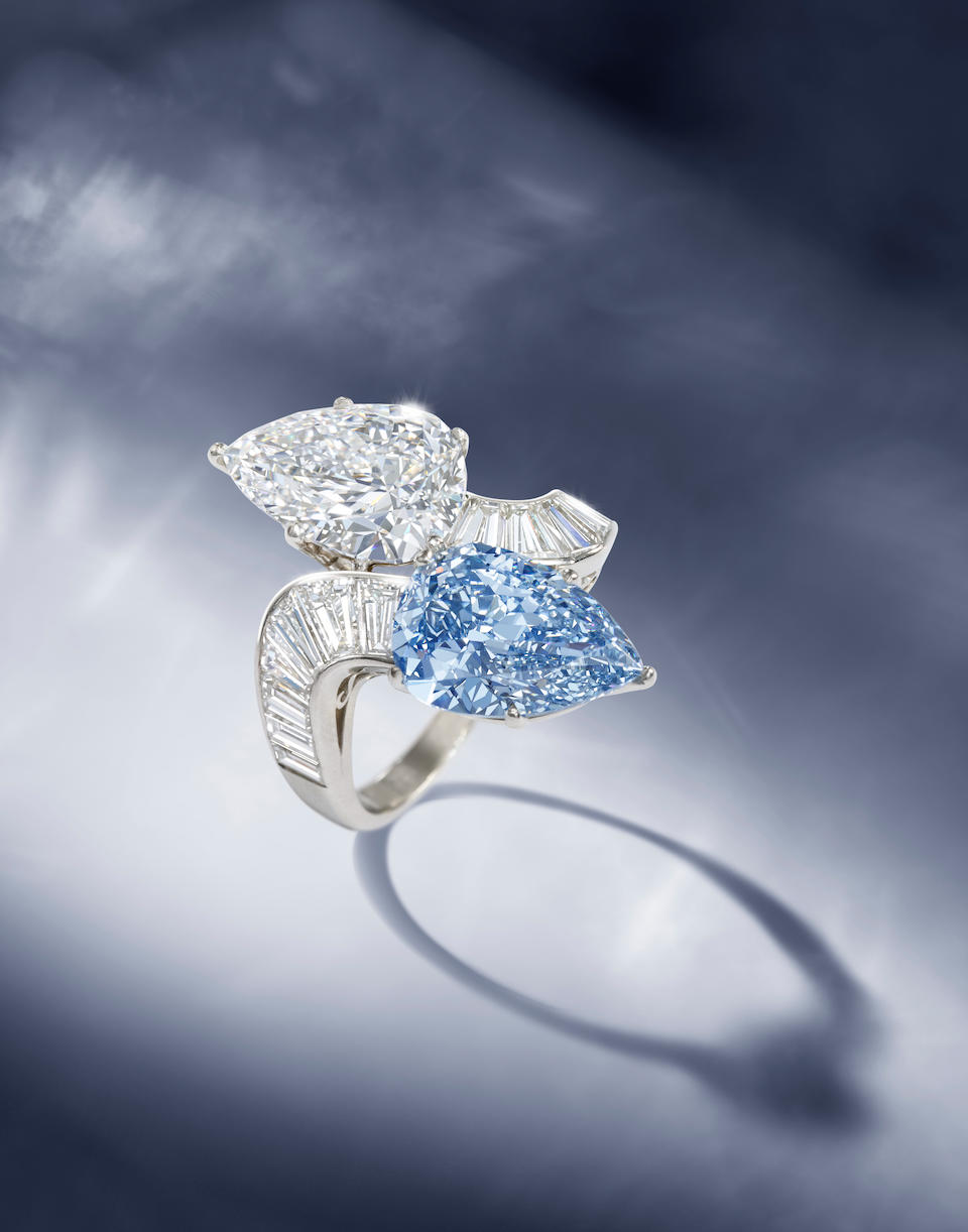 An impressive diamond and fancy vivid blue diamond crossover ring, by Bulgari,