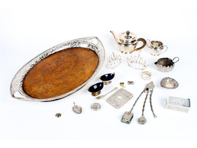 An oval Continental silver tray with pierced foliate gallery
