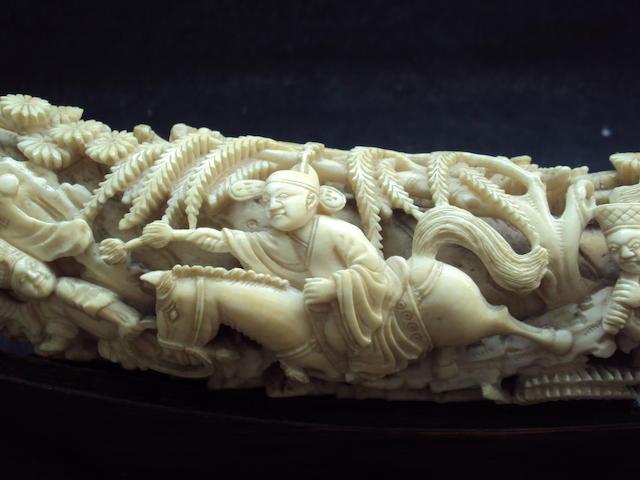A Chinese ivory tusk on stand