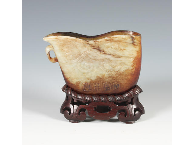 An oval jade cup, Qing dynasty