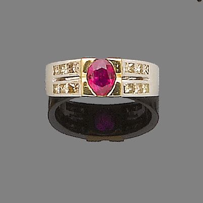 A ruby and diamond band ring
