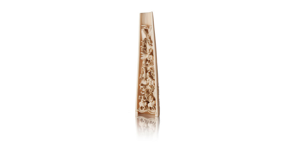 A carved ivory wrist rest 19th century