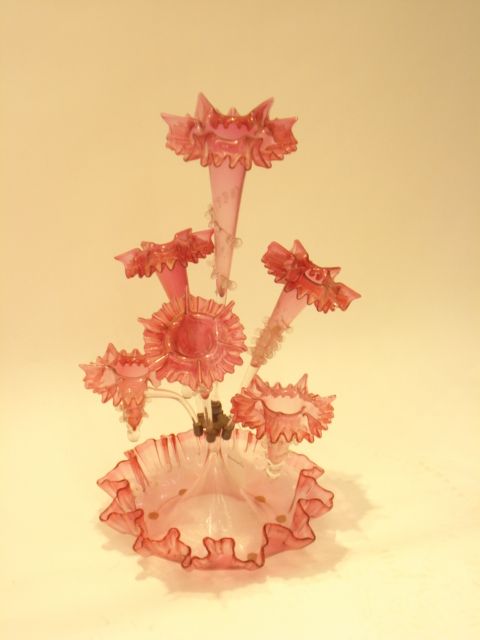 Two late Victorian ruby glass epergnes
