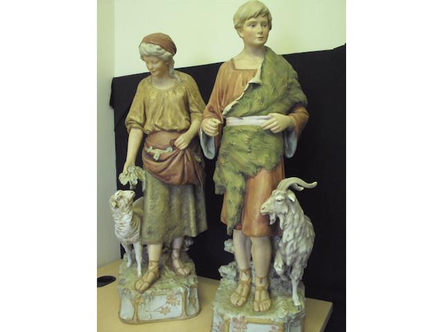 A pair of large Royal Dux figures of shepherd and shepherdess