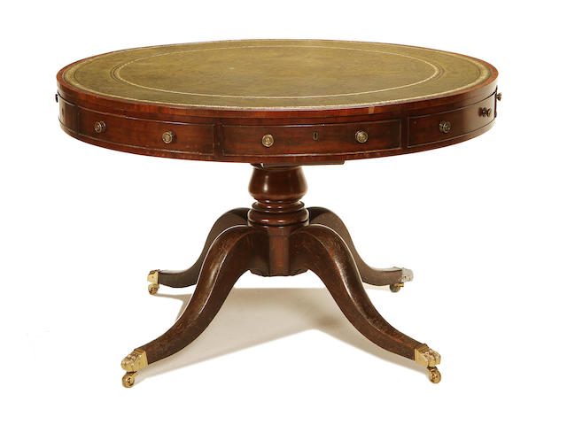 A Regency mahogany drum top library table