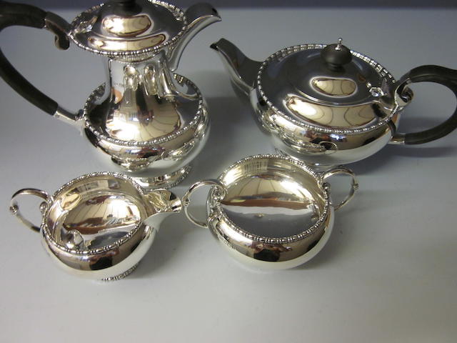 A four piece  tea service by Walker and Hall, Sheffield 1955,  (4)