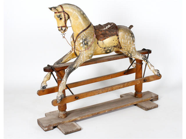 A circa 1900 polychrome painted rocking horse