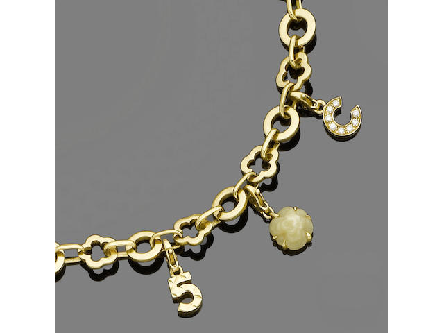 A gold charm bracelet and necklace, by Chanel (2) (partially illustrated)