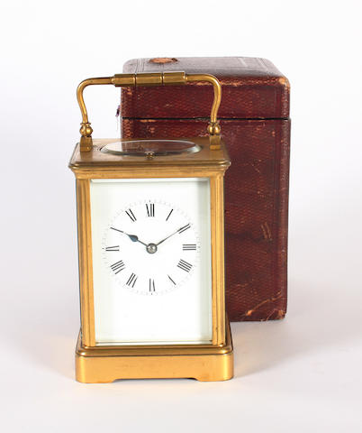 An early 20th century French gilt brass Corniche cased carriage clock