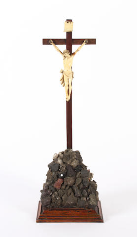 A small continental carved ivory figure of Christ on the cross, 19th century
