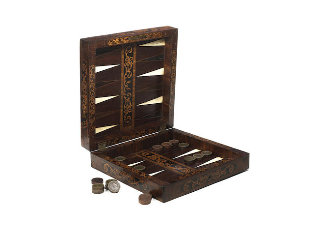 A kingwood, oak, padouk, ebony and ivory inlaid games board/box, South German, late 17th century,