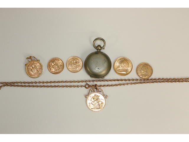 A collection of gold coins and coin pendants,
