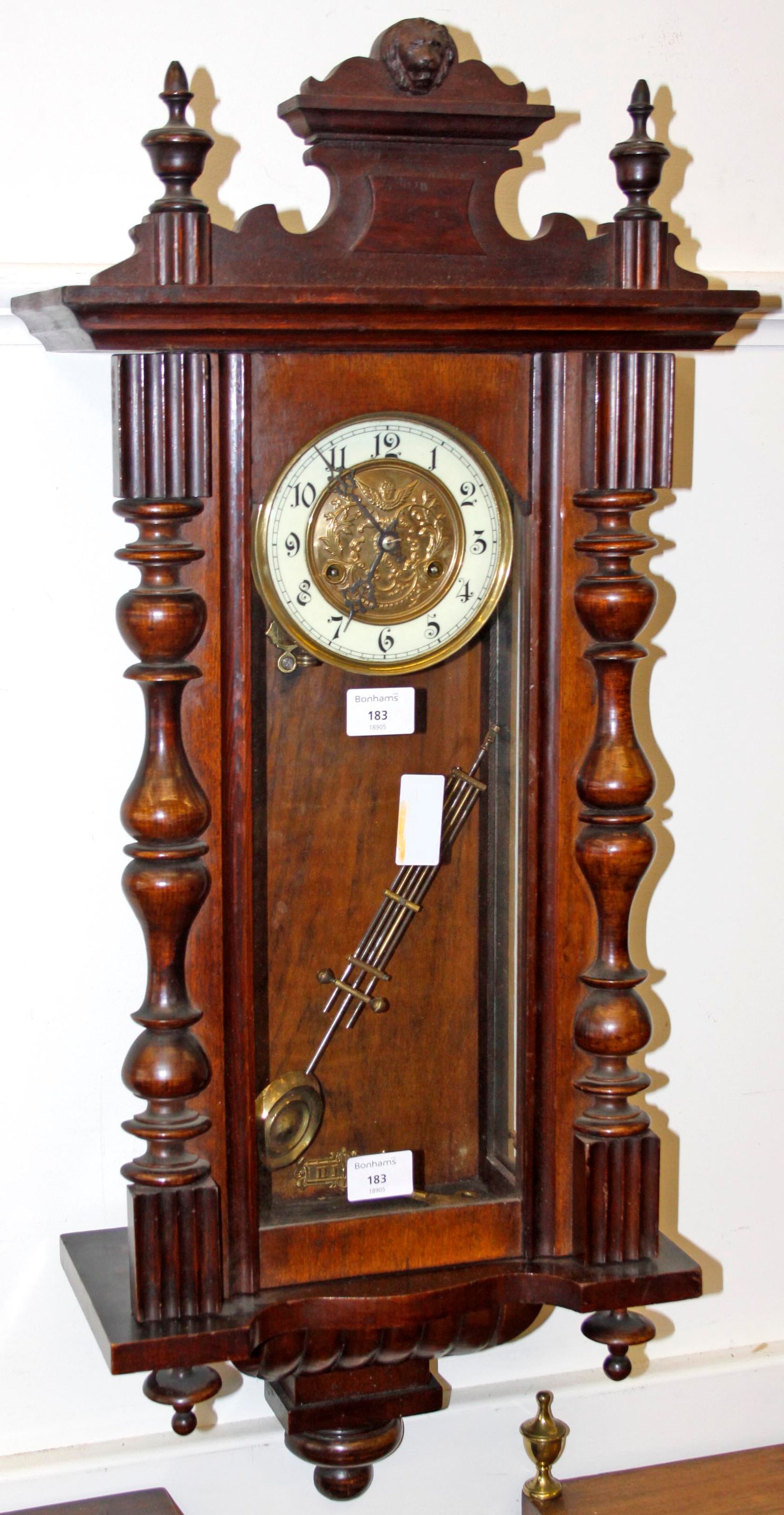 A late 19th century spring driven wall clock