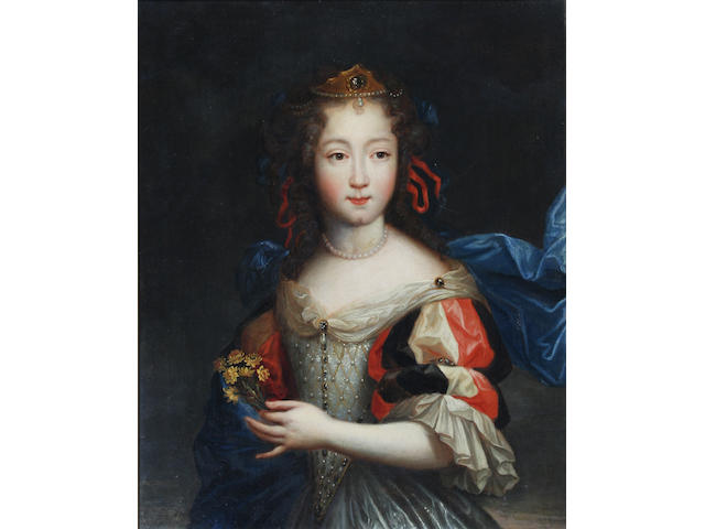 Circle of Pierre Mignard I (French, 1612-1695) Portrait of a young woman, half length, holding a posy 42 x 33cm.