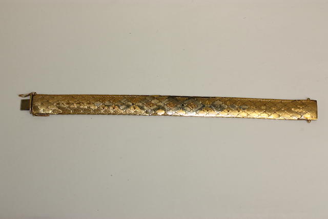 An 18ct gold broad bracelet