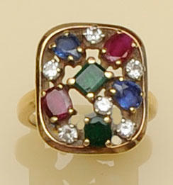 A diamond, ruby, sapphire and emerald dress ring