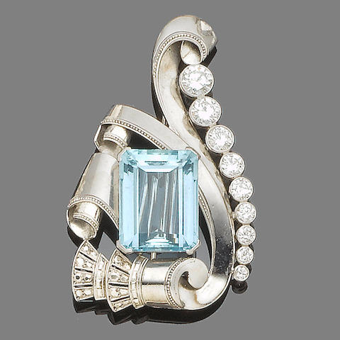 An aquamarine and diamond brooch,