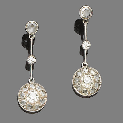 A pair of diamond-set earrings,