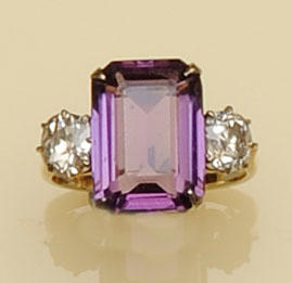 An amethyst and diamond dress ring