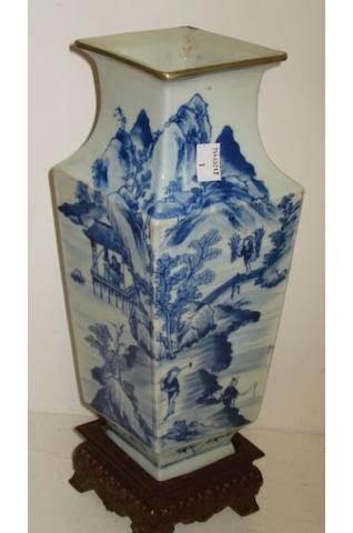 A Chinese late Qing Long section porcelain vase, painted in blue and white with a continuous scene of figures fishing in river landscapes, on a wooden stand, 32cm (2).