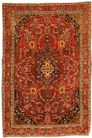 A Sarouk rug, West Persia, circa 1900, 6 ft 7 in x 4 ft 5 in (200 x 135 cm) good condition, minor losses at each end