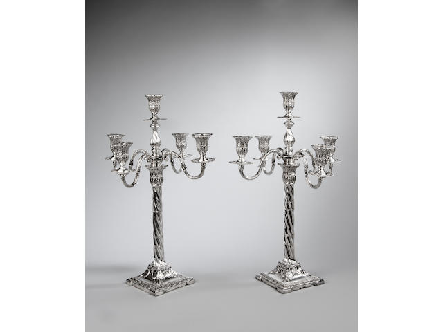 A pair of Edwardian silver five light candelabra by Henry Wilkinson Sheffield 1904