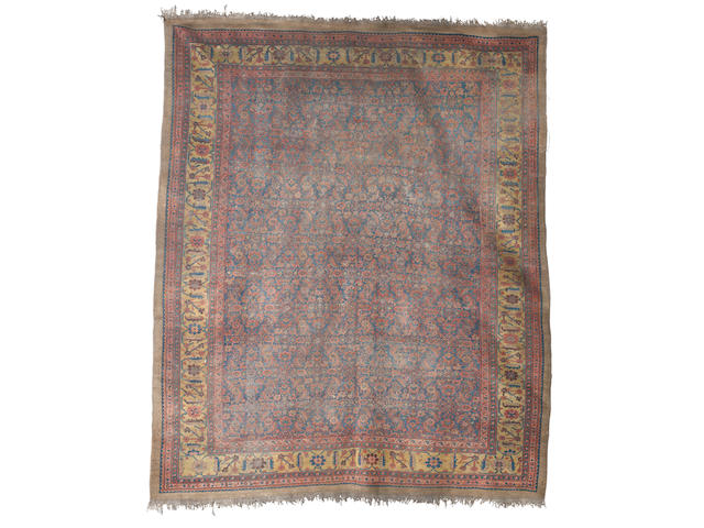 A Bakshaish carpet, West Persia, circa 1890, 14 ft 1 in x 11 ft 8 in (430 x 356 cm) some wear and damage