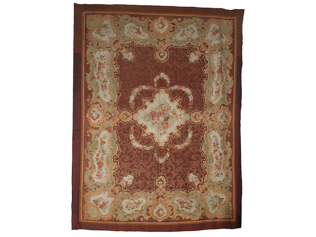 A large Aubusson carpet, France, circa 1880 21 ft 7 in  x 17 ft (650 x 518 cm)