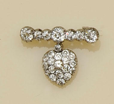 A diamond heart shaped brooch
