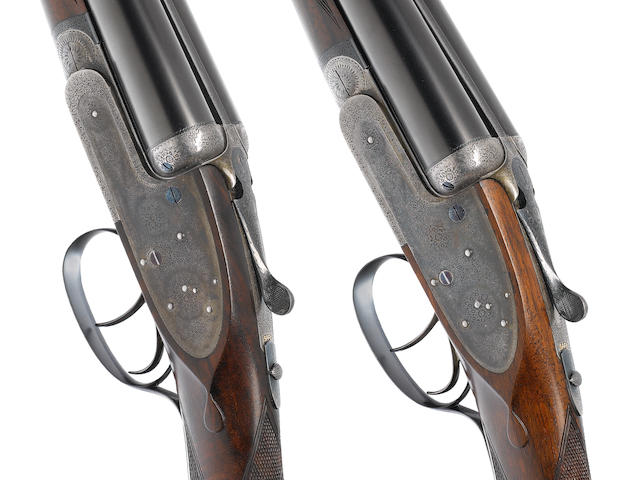 A fine pair of 12-bore (2 5/8in) self-opening sidelock ejector guns by J. Purdey & Sons, no. 24108/9 Formerly the property of H.L. Visser In their brass-mounted oak and leather case with makers accessories and later canvas cover