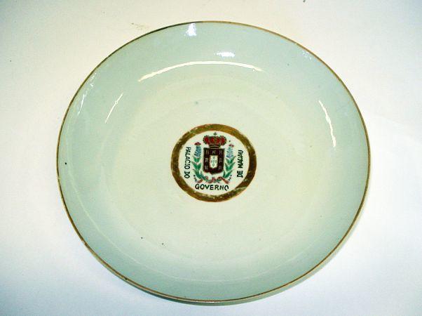 A famille rose armorial dish, from the palace of the Governor of Macau Tongzhi seal mark