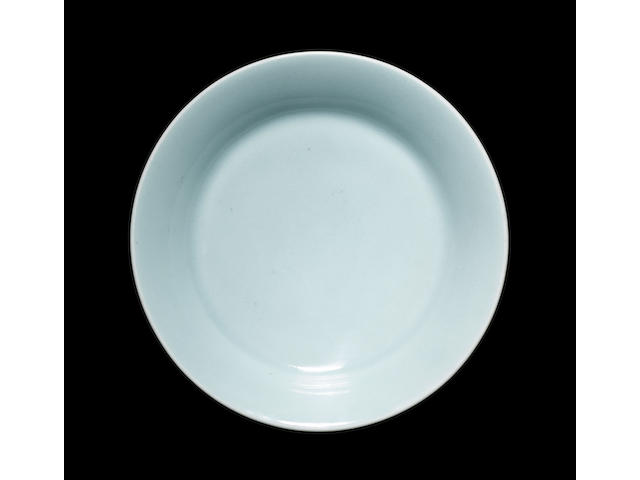 A Clair-de-lune monochrome dish of circular form, with a Qianlong seal mark