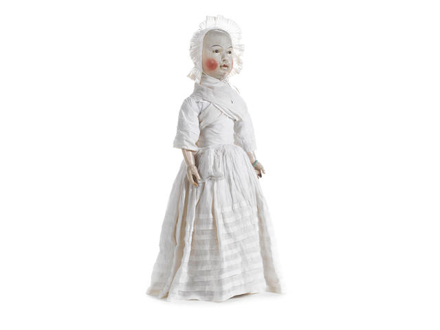 A rare and large William and Mary wooden doll, circa 1690