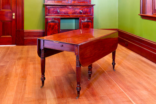 A rare Australian cedar Pembroke extension dining table with three extra leaves circa 1830