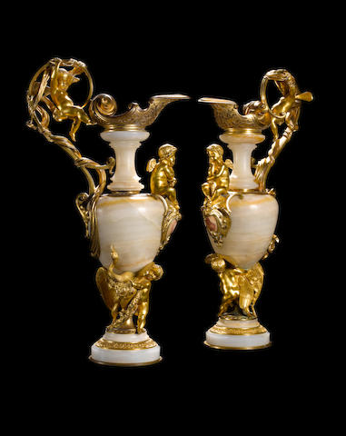 A pair of French mid-19th century gilt-bronze and onyx ewersby Compagnie des marbres Onyx d'Algerie, the model exhibited at the 1862 International Exhibition, London