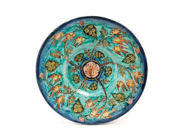 A Della Robbia pottery charger, by John Cecil Shirley Dated 1905